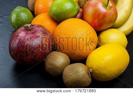 Many Various Fruits On A Black Background