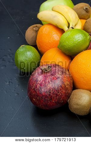 Many Various Fruits On A Black Background