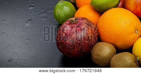 Many Various Fruits On A Black Background
