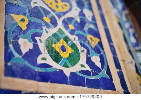 Part of deep blue majolic tiled wall, Shah-i-Zinda - UNESCO World Heritage Samarkand Uzbekistan.