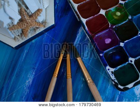 blue sea background drawn in colors on paper