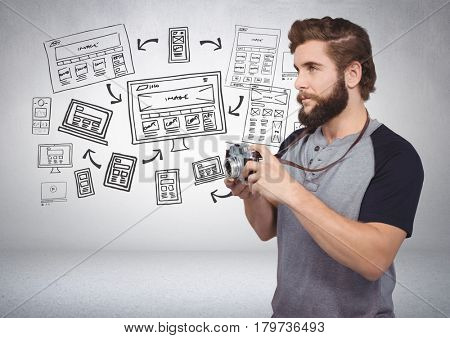 Digital composite of Man with camera and image screens graphic drawings