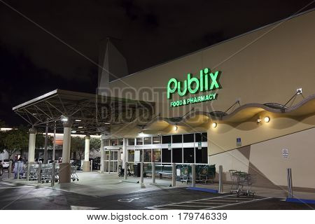 Miami FL USA - March 12 2017: Publix food and pharmacy grocery store illuminated at night. Miami Florida United States