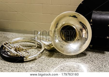 sousaphone resting before the start of marching band rehearsal