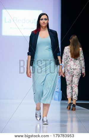 MOSCOW RUSSIA - MARCH 22 2017: Model walk runway for LA REDOUTE & PLUS SIZE MOSCOW catwalk at Autumn-Winter 2017-2018 Moscow Fashion Week. Plus-size fashion models.