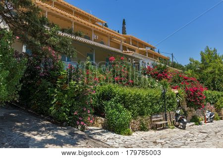 AGIOS NIKITAS, LEFKADA, GREECE JULY 16, 2014: Traditional houses in village of Agios Nikitas, Lefkada, Ionian Islands, Greece