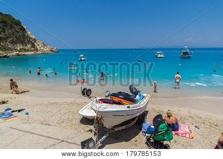 AGIOS NIKITAS, LEFKADA, GREECE JULY 16, 2014: Blue waters of beach of village of Agios Nikitas, Lefkada, Ionian Islands, Greece