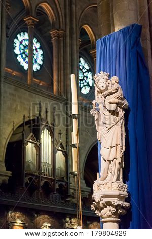 PARIS - SEPTEMBER 25, 2013:The Statue of Virgin and Child inside Notre-Dame de Paris, France.