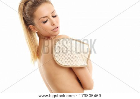Woman with bath sponge isolated on white with healthy skin