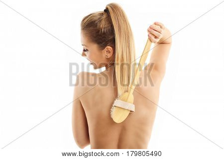 Woman with bath sponge isolated on white with healthy skin
