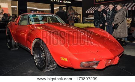Moscow Russia - April 02 2017: Red Chevrolet Corvette C3 String Ray USA 1974. Retro car exibition in shopping mall Metropolis.