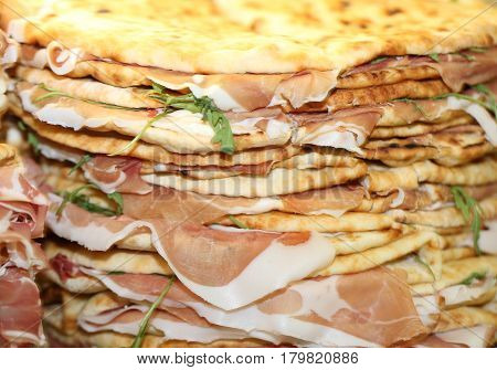 Italian Typical Piadina With Ham And Arugula