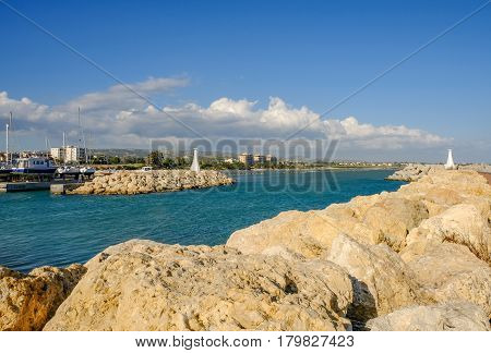 Entrance to the marina of the fishing village of Zygi Cyprus Shot taken in springtime on a sunny day.