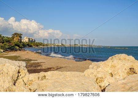 Beach view at the fishing village of Zygi in Cyprus in Spring on a bright sunny day.