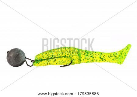 Rubber silicone green fishing bait with plummet and hook isolated on white background.