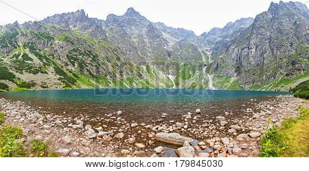 Panoramic view of Czarny Staw pod Rysami lake Tatra Mountains Poland
