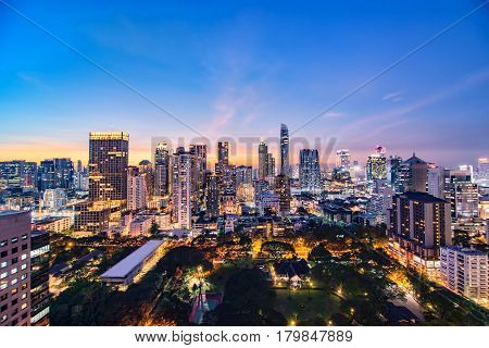 Bangkok city at sunset Mahanakorn tower Silom area Thailand
