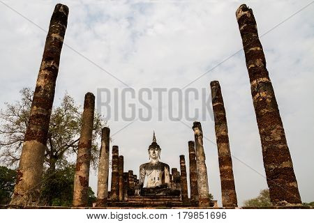 Buddha image in Sukhothai Historical Park Old Town historic civilization history Thailand.