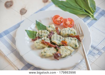 home made wild garlic gnocchi with bacon and cheese