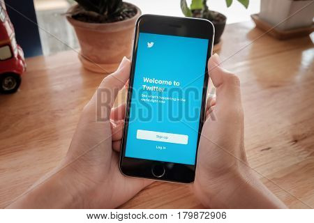 CHIANGMAI THAILAND -Feb 132017:Iphone 6s open Twitter app.Twitter is an online social networking and microblogging service that enables users to send and read 