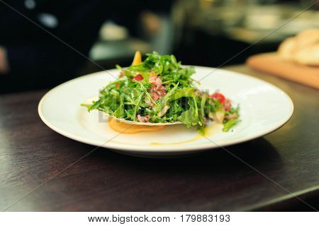 salad mix with meat and vegetables on the plate