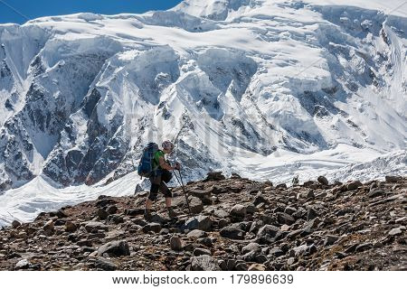 Trekker In Front Of Manaslu Glacier On Manaslu Circuit Trek In Nepal