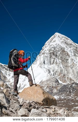 Trekker Approaching Pumori Mountain In Khumbu Valley On A Way To Everest Base Camp