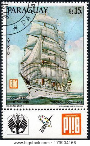 UKRAINE - CIRCA 2017: A postage stamp printed in Paraguay shows Gorch Fock three-masted barque built for educational purposes commissioned by the German Navy circa 1958
