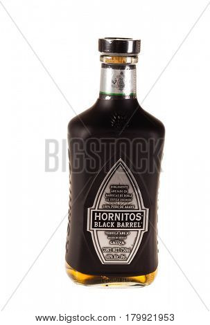 Colbert, WA - April 1, 2017: Hornitos Black Barrel Mexican tequila isolated on white, illustrative editorial