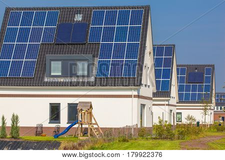 New Houses With Solar Panels In A Modern Street