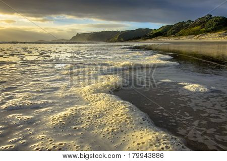Foam On The Surf Of Pakiri Coast, New Zealand