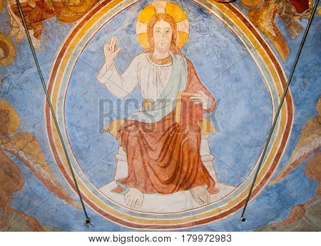 Majestas domini. Medieval mural of Christ sitting on a throne. Slaglille Denmark - September 24 2010