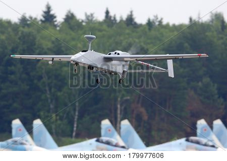 KUBINKA, MOSCOW REGION, RUSSIA - JUNE 14, 2015: UAV Forpost of russian air force takes off at Kubinka air force base.