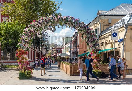 MOSCOW - AUGUST 7 2016: Flower arch on Klimentovsky lane .This area was reconstructed and became pedestrian in 2014.