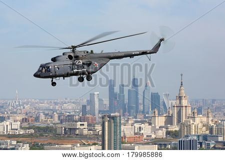 MOSCOW RUSSIA - MAY 9, 2015: Mil Mi-8AMTSH helicopter of Russian Air Force during Victory Day parade flying over Moscow city.