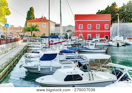Zadar, Croatia - July 14, 2017: Pleasure Boats And Fishing Boats On The Pier In Fosa Bay In The Spa 