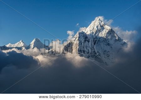 Dramatic Mountain View Of Ama Dablam Summit On The Famous Everest Base Camp Trek In Himalayas, Nepal