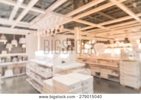 Blurry Background Variety Of Table, Ceiling, Floor Lamps At Furn