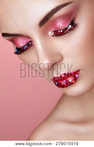 Face Of Beautiful Woman With Holiday Makeup Heart