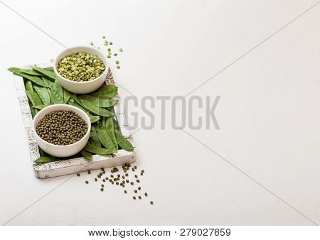 Bowl Of  Mung Beans And Split Peaswith Raw Organic Mangetout In Vintage Wooden Box On White Kitchen 