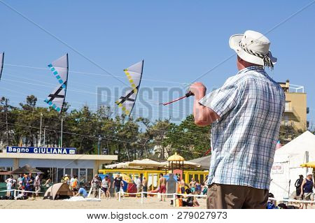 Cervia, Italy, April 2018: Many Colorful Kites In Different Shapes At Cervia International Kite Fest