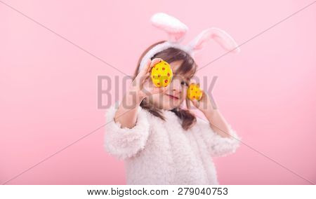 Portrait Of A Little Girl With Bunny Ears W Easter Eggs