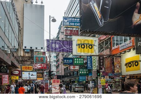 Hong Kong, China  - May 13, 2010: Kowloon Mainland Section. Colorful Commercial Sign, Print And Ligh