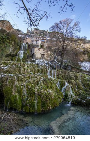 Waterfall In  The Village Of Orbaneja Del Castillo In The Province Of Burgos