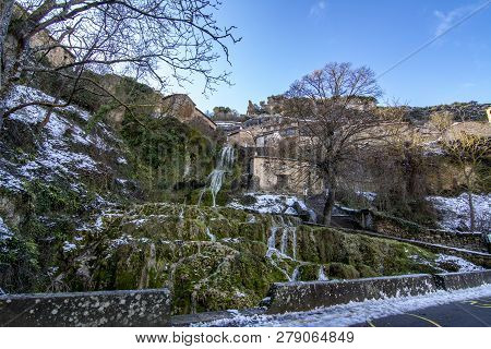 Waterfall In  The Village Of Orbaneja Del Castillo In The Province Of Burgos