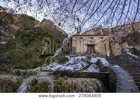 Waterfall In  The Village Of Orbaneja Del Castillo In The Province Of Burgos