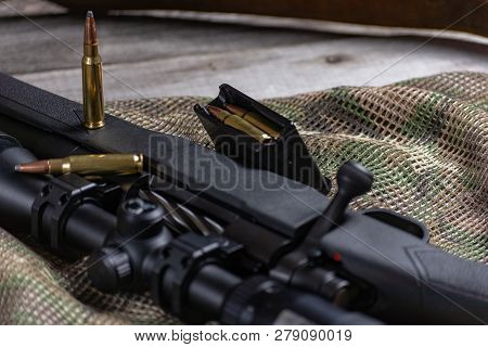 Rifle Bolt Action Sniper Weapon Gun And Ammo Isolated On Multicam Background