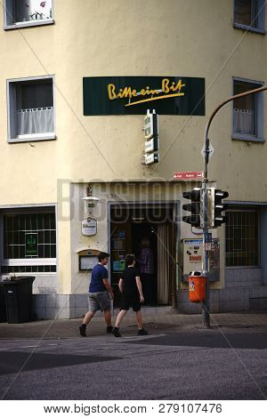 Koblenz, Germany - April 08: Pedestrians Pass The Corner Entrance Of The Bar And The Restaurant Fran