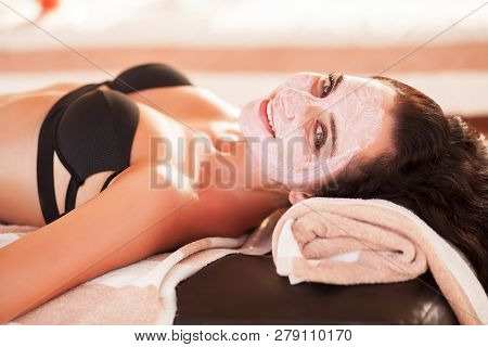 Spa Mask. Beautiful Woman Get Spa Mask On The Sunny Beach In Spa Salon Outdoor. High Quality. Scin C