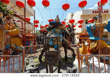 Manado, Indonesia - August 04 2015: Klenteng Kwan Kong Temple Courtyard With Warrior Statues. Kwan K